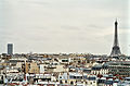 Вежа Монпарнас (зліва) та Ейфелева вежа - денна панорама з вежі готелю Concorde Lafayette