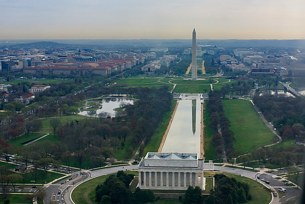 The National Mall with the Lincoln Memorial and its reflecting pool (foreground), the Washington Monument behind it, and the United States Capitol (ba
