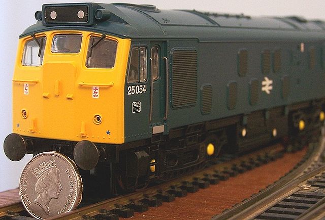 U.K. prototype model of a OO scale (1:76) British Rail Class 25 shown with five pence coin for scale