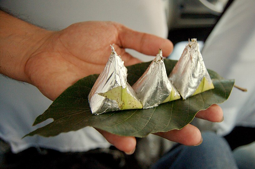 Paan (betel leaves) being served with silver foil at Sarnath near Varanasi, India.