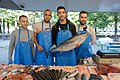 * Nomination The sellers of Fishmonger Nasser are showing the fish at the market place Carnot at Saint-Étienne France. --Touam 16:51, 4 August 2019 (UTC) * Decline  Oppose Perspective correction needed + it looks artificial. Like some kind of effect (dehaze?) was applied --Podzemnik 00:28, 8 August 2019 (UTC)