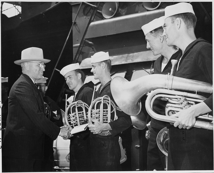 File:President Harry S. Truman thanks members of the ship's band after one of their concerts on the U. S. S. Augusta off... - NARA - 198723.tif