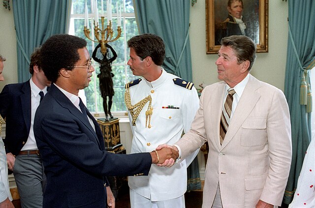 President Reagan greets Arthur Ashe (left) in 1982