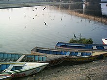 Boats floating beside the Ravi River in Lahore