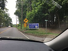 Sign put up on Holmdel Road, urging that the Horn Antenna and its surrounding area be saved Save Crawford Hill and the Horn Antenna sign on Holmdel Road.jpg