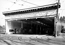 Fremont Trolley Barn in use by Seattle Municipal Railway, 1919. Seattle Municipal Railway car barn in Fremont, September 23, 1919 (SEATTLE 72).jpg