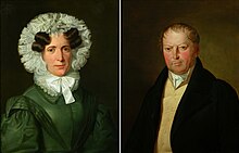 At left, a painted portrait of a woman in a black dress with a frilled hood and ruffled collar. At right, a painted portrait of a man in a black coat wearing a cravat.