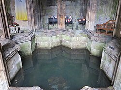 The well basin St Winefride's Well (27960813412).jpg