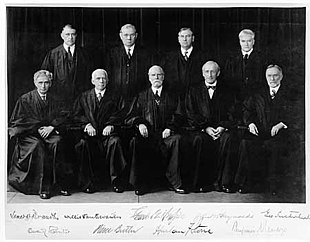 The Hughes Court, 1932-1937. Front row: Justices Brandeis and Van Devanter, Chief Justice Hughes, and Justices McReynolds and Sutherland. Back row: Justices Roberts, Butler, Stone, and Cardozo. Supreme Court 1932.jpg