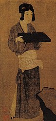 Tang dynasty woman wearing a cross-collared robe