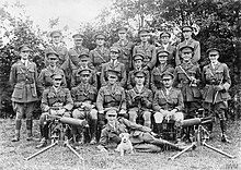 Group of officers of the 39th Battalion, Machine Gun Corps, including the Commanding Officer (seated, third from the left), Rombly, 20 July 1918. The British Army on the Western Front, 1914-1918 Q9070.jpg