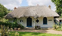 This cottage orné was built by the rector George Glasse in 1809.