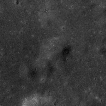 Apollo 17 panoramic camera image. Note that the lunar module Challenger is visible as a bright pixel near top center. Trident crater AS17-P-2750 ASU.jpg