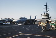 USS America (CV-66) prepares to launch F-14 Tomcat off coast of Libya 1986