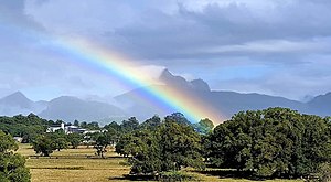 Wollumbin AKA Mt Warning with Rainbow.jpg