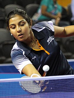 XIX Commonwealth Games-2010 Delhi (Women’s Table Tennis) Poulomi Ghatak of India in an action against Zhenhua Vivian Tan of Australia, at Yamuna Sports Complex, in New Delhi on October 06 2010 (cropped).jpg