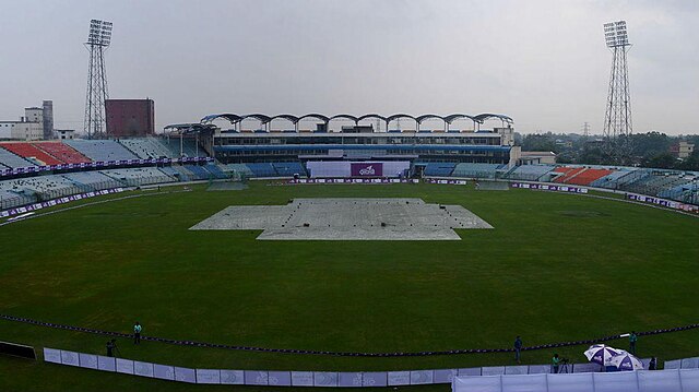 Zahur Ahmed Chowdhury Stadium's pitch covered on a rainy day during a Test match