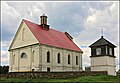 Assumption Church med et klokketårn i landsbyen Pleban