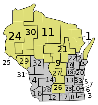 after redistricting, changes highlighted 1882 wi act 242 senate districts.svg