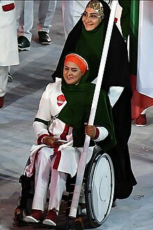 Zahra Nemati, Iranian archer, bearing the flag for the Iranian team during the 2016 Summer Olympics opening ceremony. 2016 Summer Olympics opening ceremony - photo news agency Tasnimnews 35.jpg