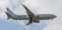 A Boeing P-8 Poseidon, tail number 168996, on final approach at Kadena Air Base in Okinawa, Japan. It has an AN/APS-154 Advanced Airborne Sensor (AAS) mounted underneath it.