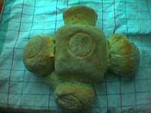 Bread of Eucharist in the Churches of the East (Prosphorus). Unlike Catholic hosts, this is leavened bread. 24-prosphore.jpg