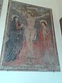 Freska s Ukřižováním s nápisem v gotických znacích FE FARE LA PAOLA DE BERNANDO PRO SVOU ODDANOST 1499.