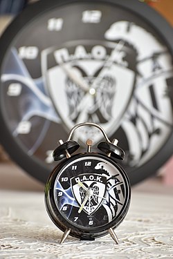 Alarm clock with sports team logo.