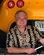 A picture of A. J. Arduengo from June '09 working on his 2009 Saffron Yellow Lotus (California Edition) Elise