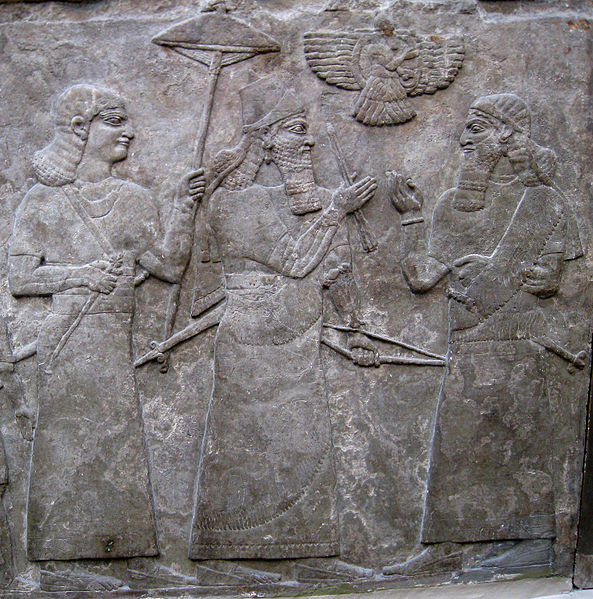 Ashur-nasir-pal II (centre) meets a high official after a successful battle.