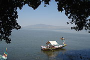 Tour boat (foreground) and fishing boat (background) on Lake Awasa