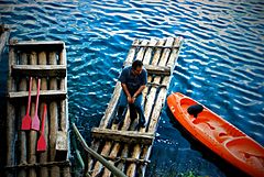 Two balsa rafts and a kayak at Lagos de Montebello in Chiapas, Mexico