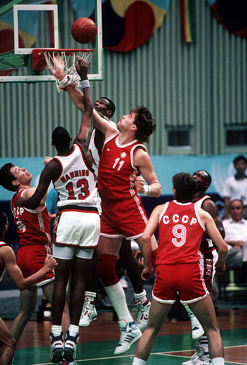 Danny Manning and the Navy's David Robinson battle Arvydas Sabonis in the 1988 Olympic semi-finals