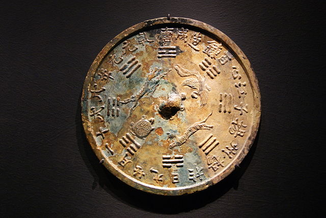 Bronze mirror with cosmological decoration from the Belitung shipwreck, including Bagua.