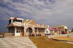 Qimein lentokentän rakennus