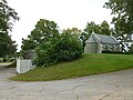 Saint Bridget Chapel in Saint Patrick Cemetery, located at 1251 Gorham Street, Lowell, Massachusetts. South and west (back) sides of building shown.