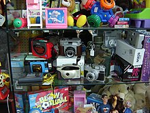 Window display in a UK charity shop. Charity-shop-Epping-029.JPG