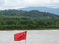 Chinese Flag on Barge along Mekong River - Laos on Other Side - Chiang Saen - Golden Triangle - Thailand (34478955674).jpg