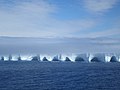 Clouds setting in on giant iceberg Giant Iceberg Coral Princess Antarctica.jpg