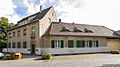 Residential and office building with gatehouse and fencing