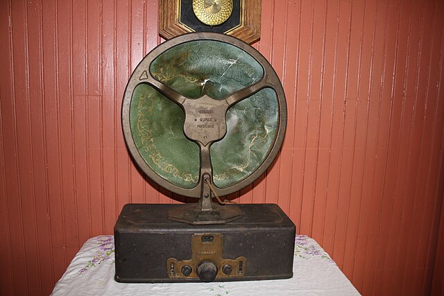 Crosley Super Musicone speaker, back of speaker shown, on top of a Crosley radio