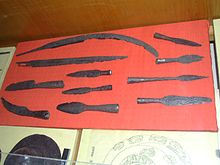 Dacian weaponry including a falx (top) exhibited in Cluj National History Museum Dacian Weapons.jpg