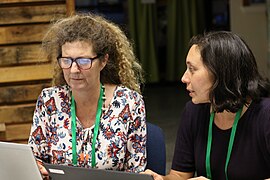 Two editors work on a Wikipedia article together at the Edit for Equity event at the Sustainability Trust in Wellington, October 2018.