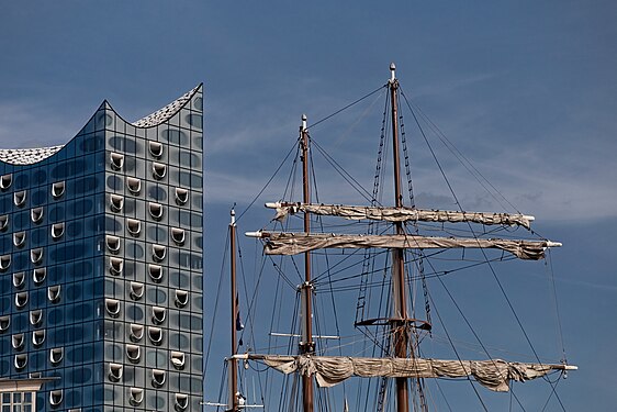 Elbphilharmonie and masts of three-master "Mare Frisium" at Hamburg harbour, Germany