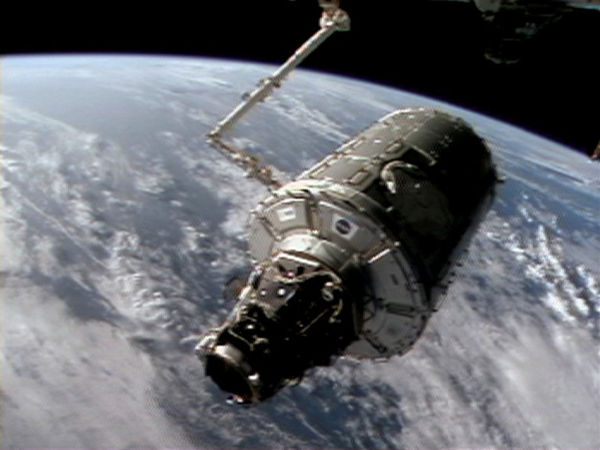 Harmony, itself manufactured in Italy on contract, was accompanied by Nespoli who acted as mission specialist. It is shown here being moved to its final docking port later the same year
