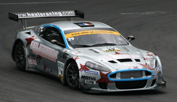 A Hexis Racing Aston Martin DBRS9 participating in an ADAC GT Masters event at the Norisring in 2008