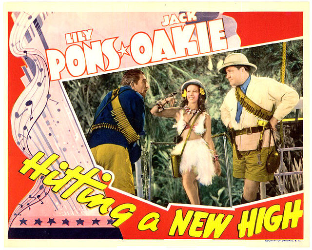 Lobby card for Hitting a New High (1937)