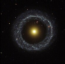 The yellow nucleus of Hoag's Object surrounded by a blue ring of stars
