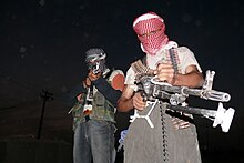 Iraqi insurgents with guns, 2006.jpg