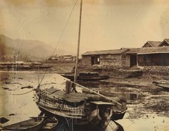 Japanese sailboat near the warehouses at Dejima, Nagasaki, Japan - presumably 1863-1865